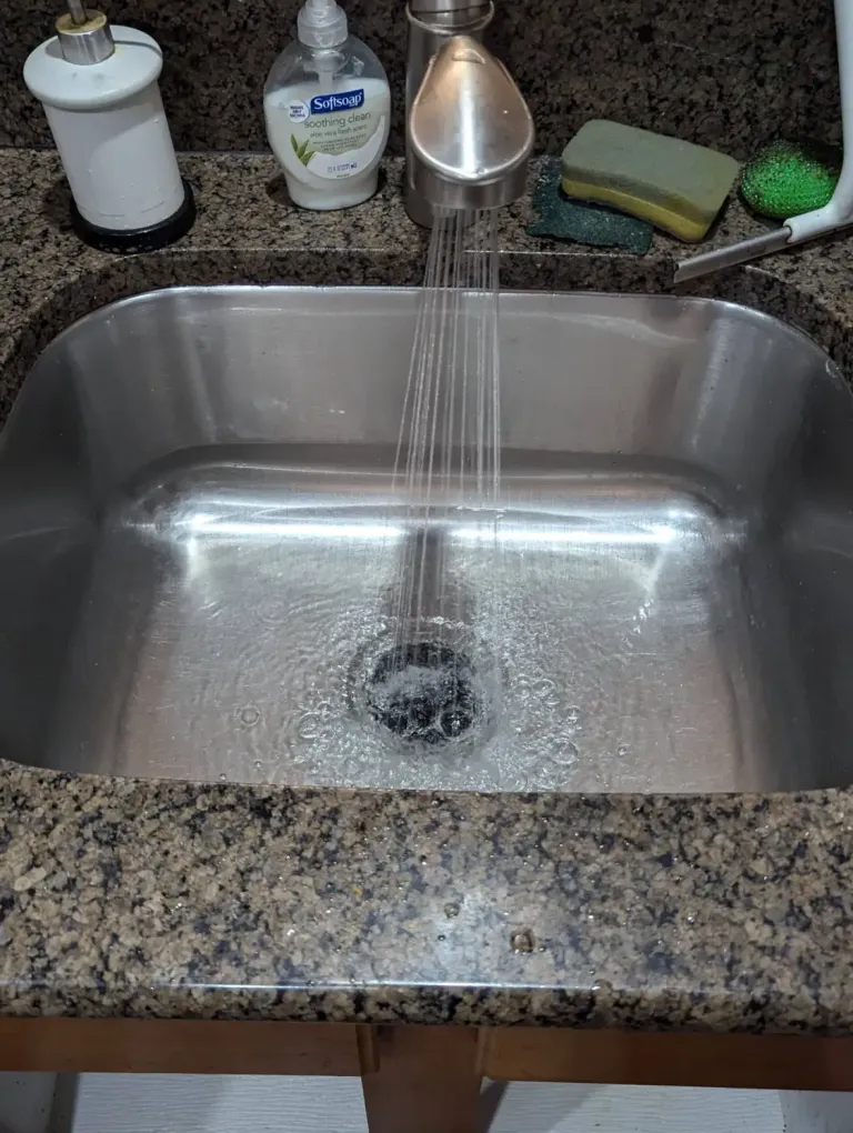 Kitchen sink after a clog was cleared.