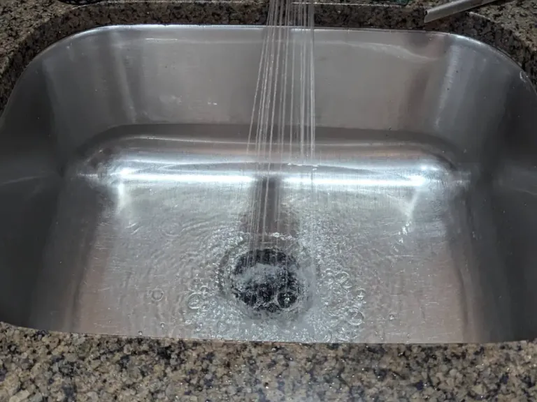 Kitchen sink after a clog was cleared.