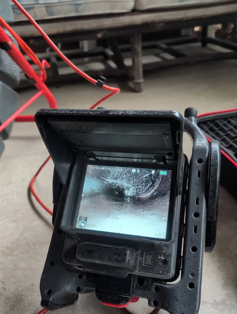 Pipe inspection camera screen during a line examination.