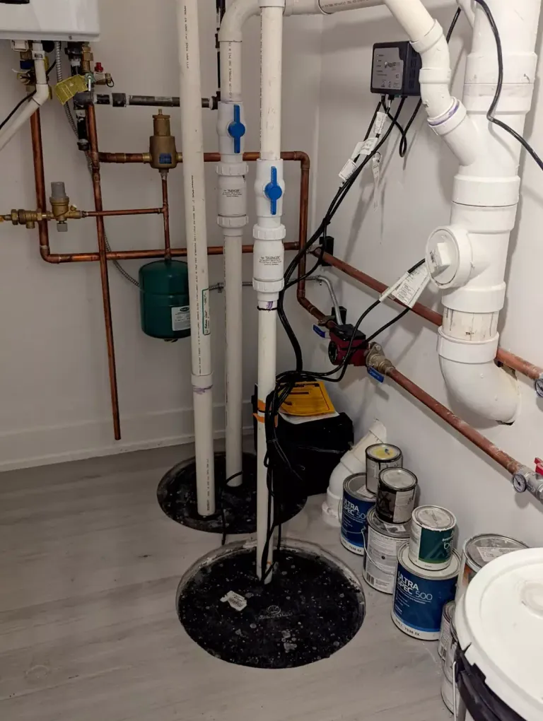 Sump pits with PVC piping.
